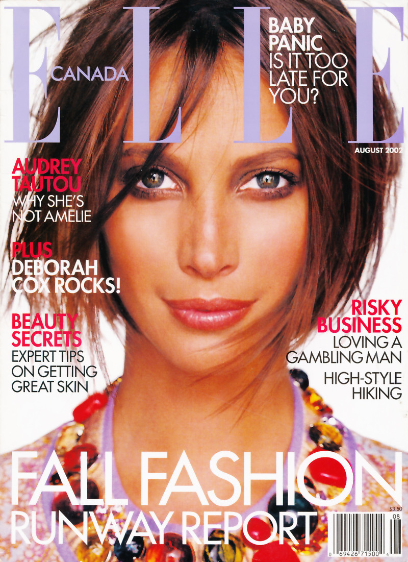 Christy Turlington featured on the Elle Canada cover from August 2002