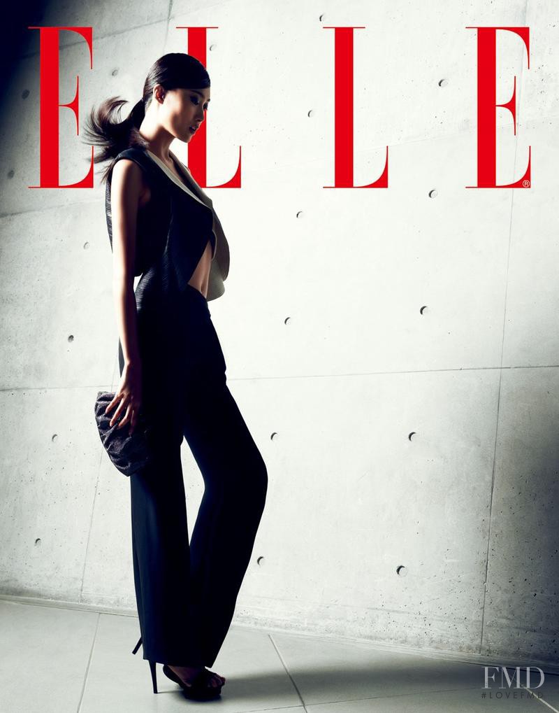 Shu Pei featured on the Elle China cover from October 2013