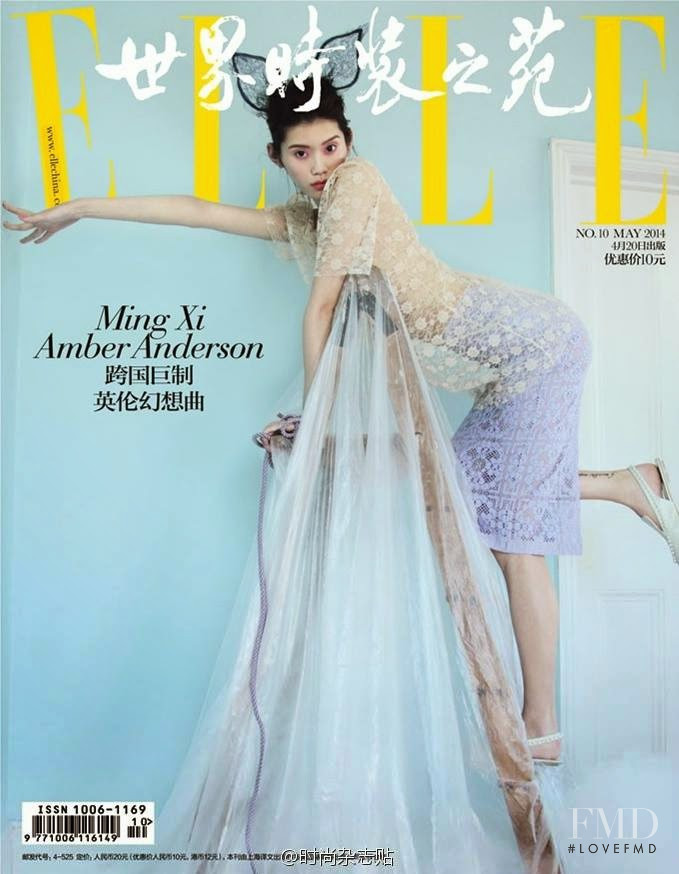 Ming Xi featured on the Elle China cover from May 2014