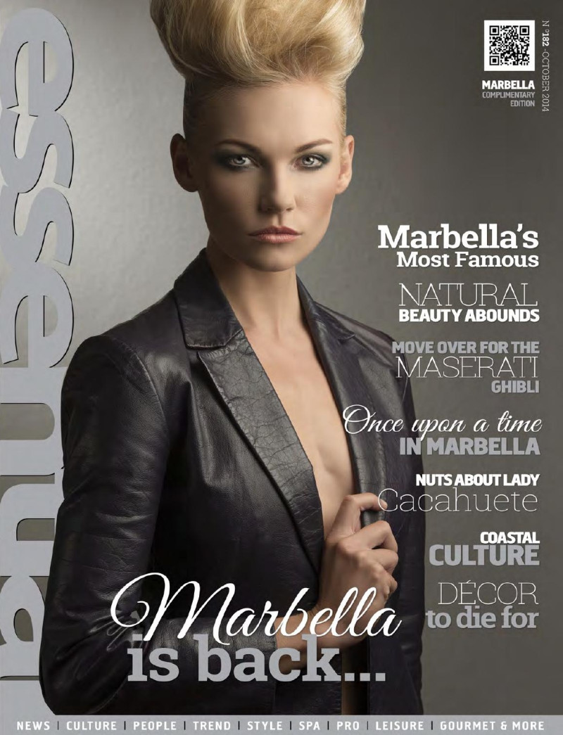  featured on the Essential Marbella Magazine cover from October 2014
