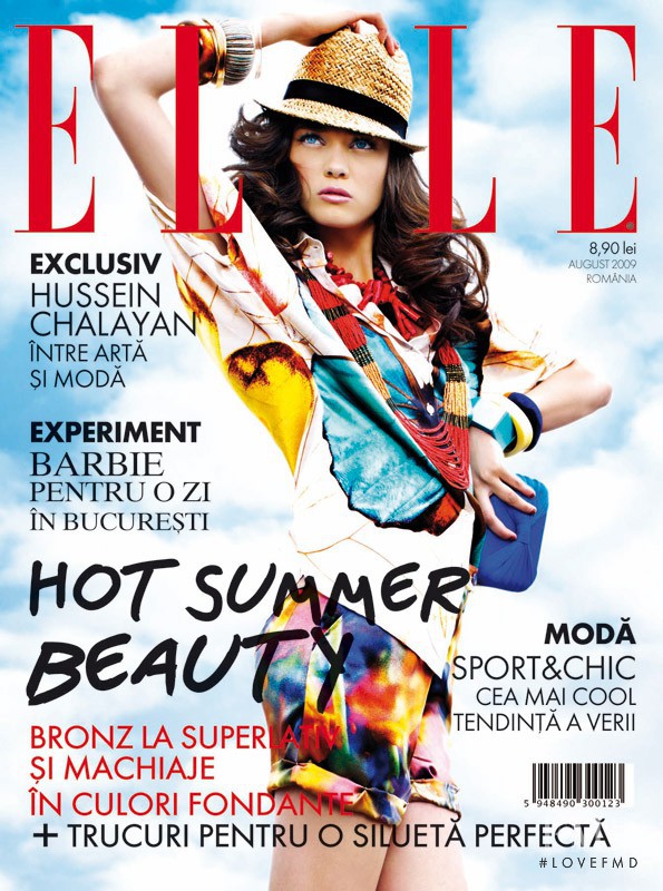 Diana Moldovan featured on the Elle Romania cover from August 2009