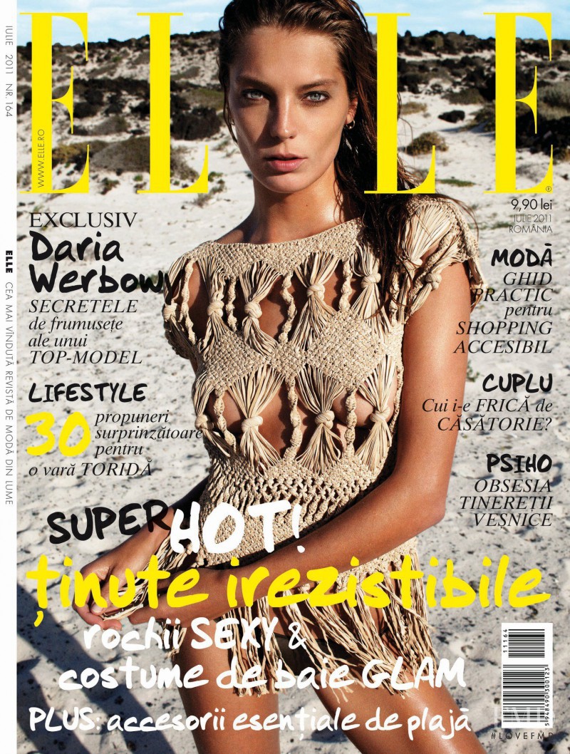 Daria Werbowy featured on the Elle Romania cover from July 2011
