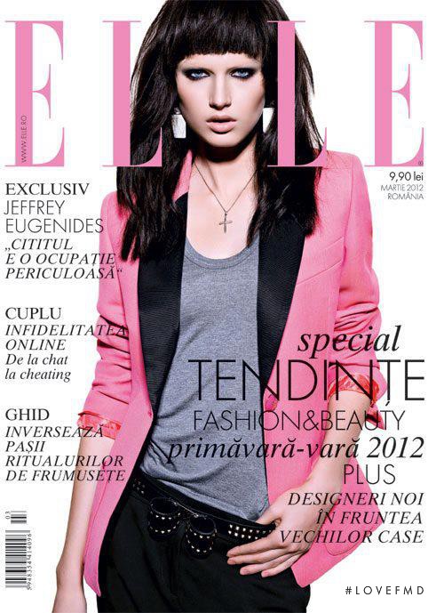 Xenia Micsanschi featured on the Elle Romania cover from March 2012