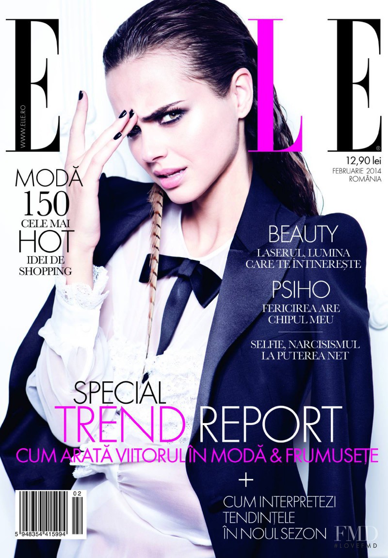 Xenia Deli featured on the Elle Romania cover from February 2014