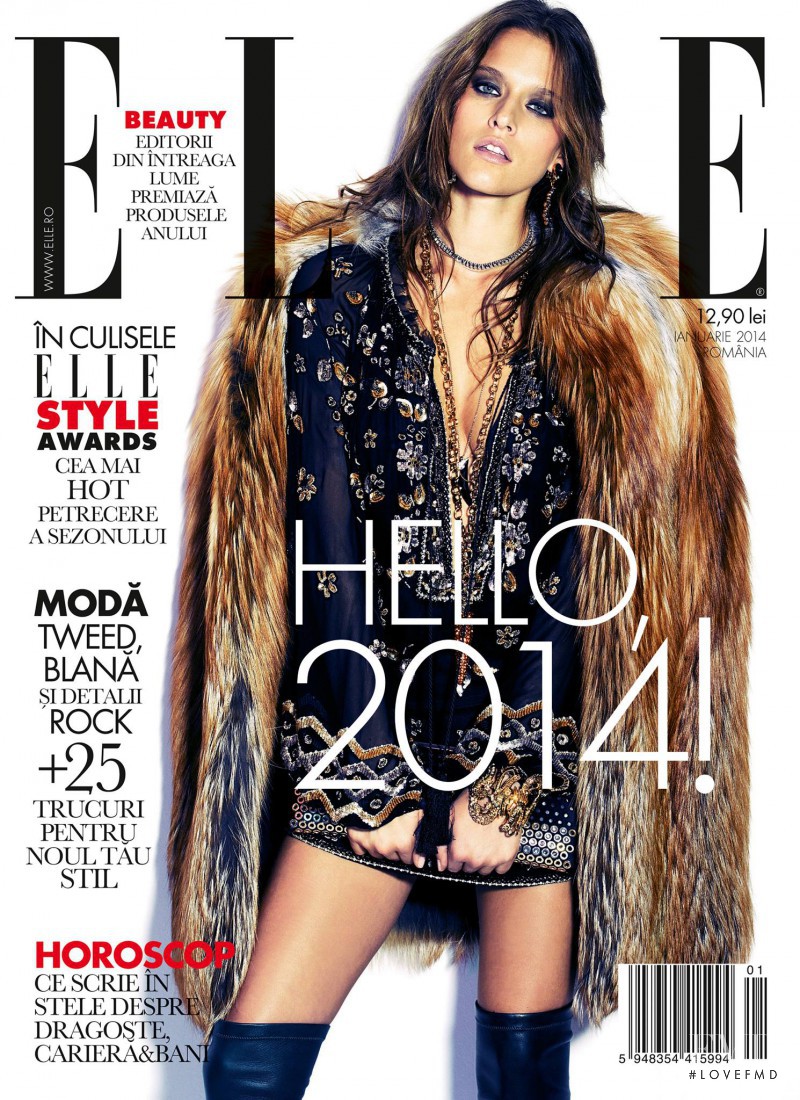 Kim Cloutier featured on the Elle Romania cover from January 2014
