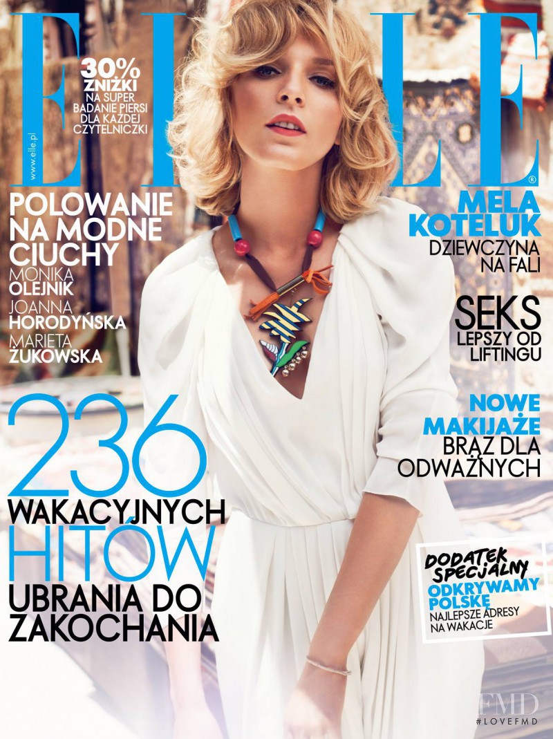 Mela Koteluk featured on the Elle Poland cover from August 2013