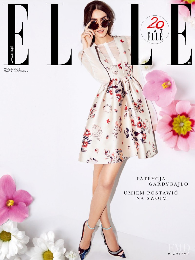 Patrycja Gardygajlo featured on the Elle Poland cover from March 2014