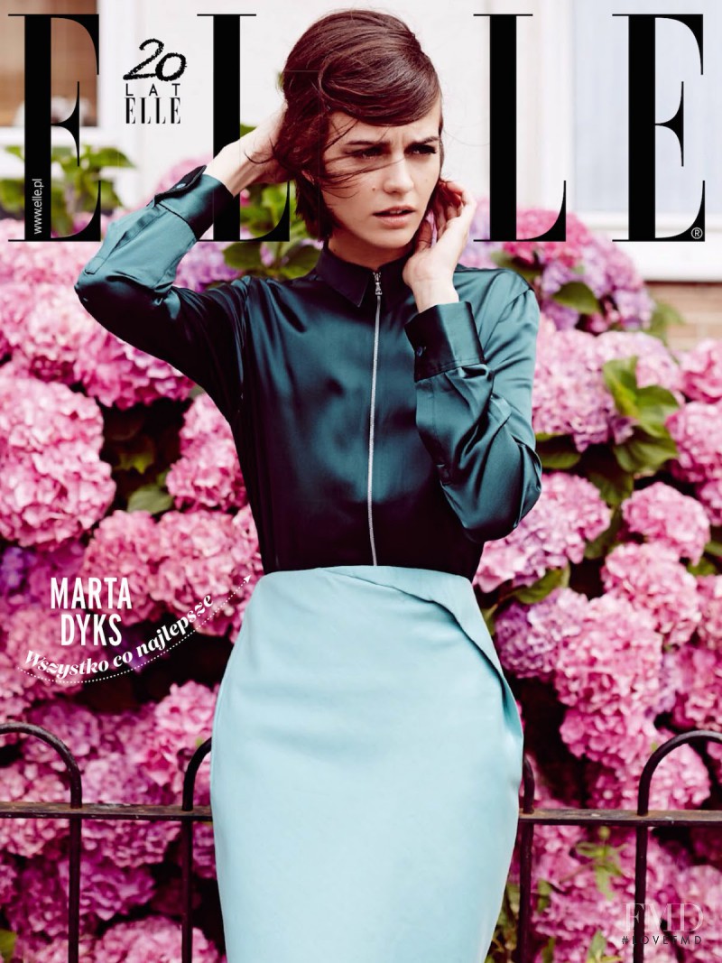 Marta Dyks featured on the Elle Poland cover from November 2014