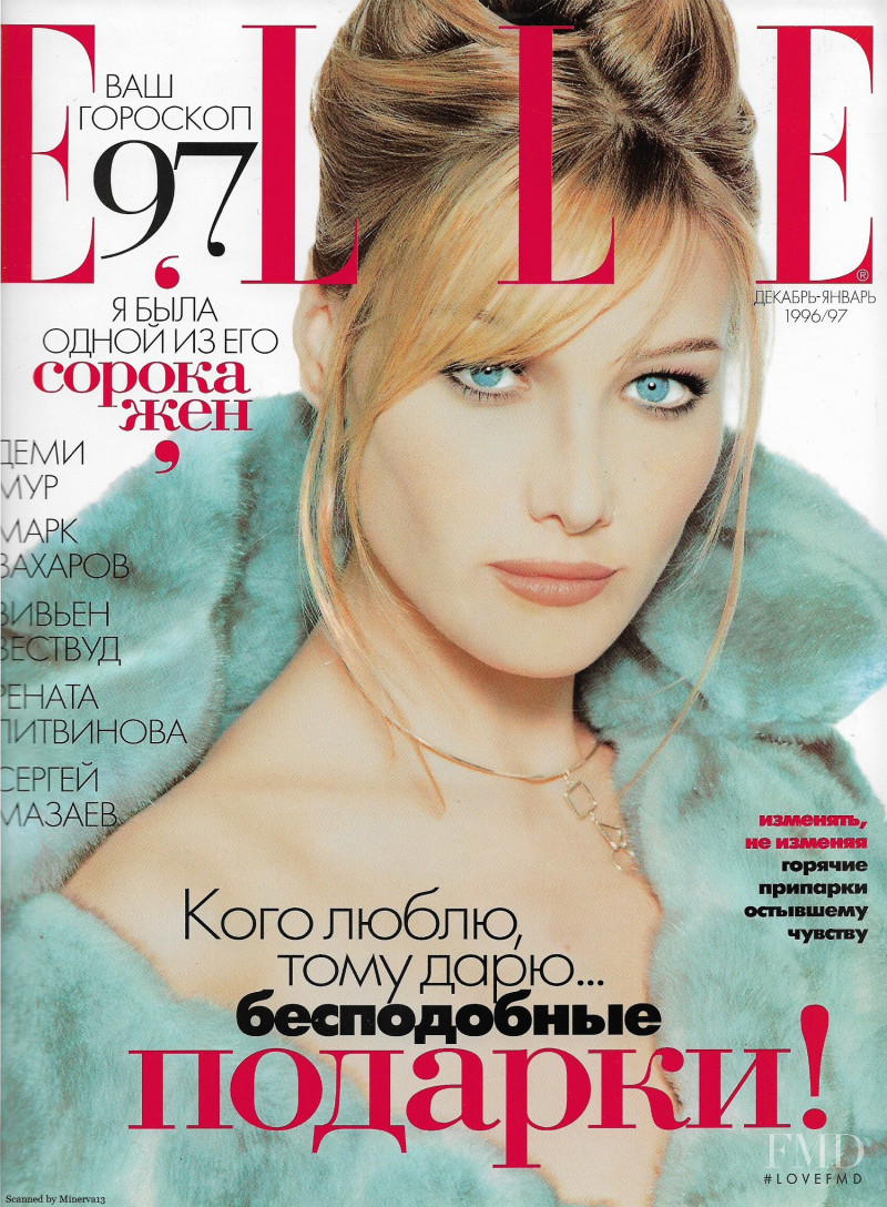 Carla Bruni featured on the Elle Russia cover from December 1996