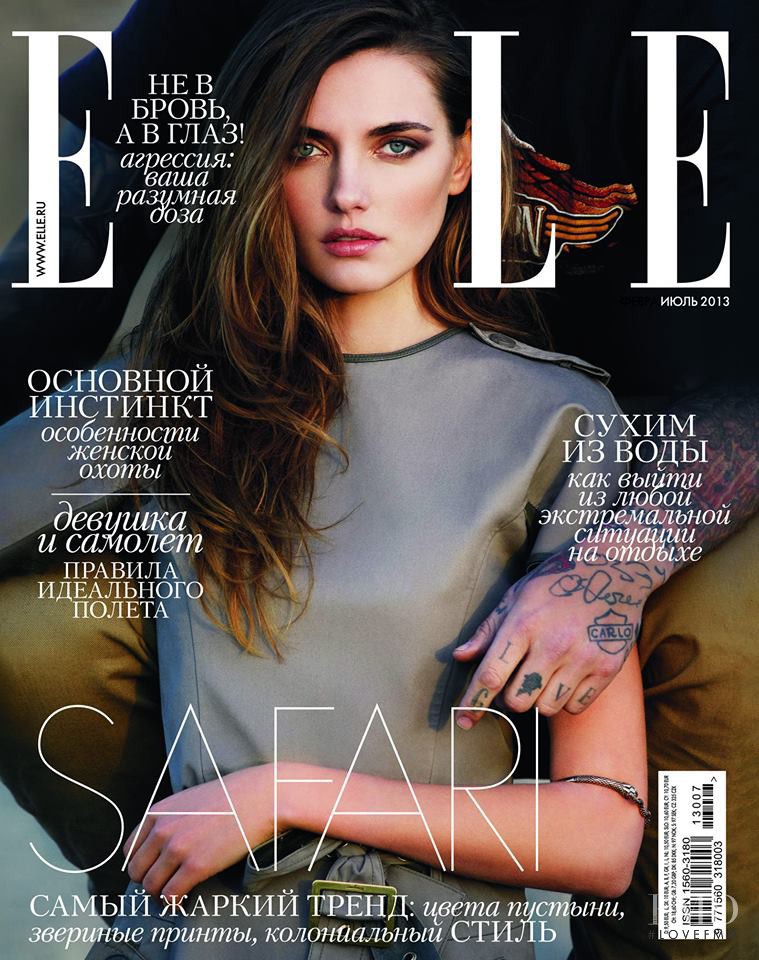 Alina Baikova featured on the Elle Russia cover from July 2013