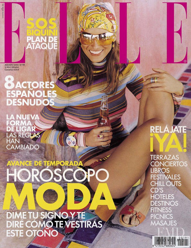 Michelle Alves featured on the Elle Spain cover from August 2002