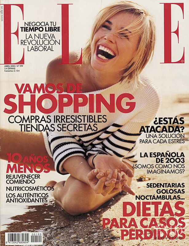 Rebecca Romijn featured on the Elle Spain cover from April 2003