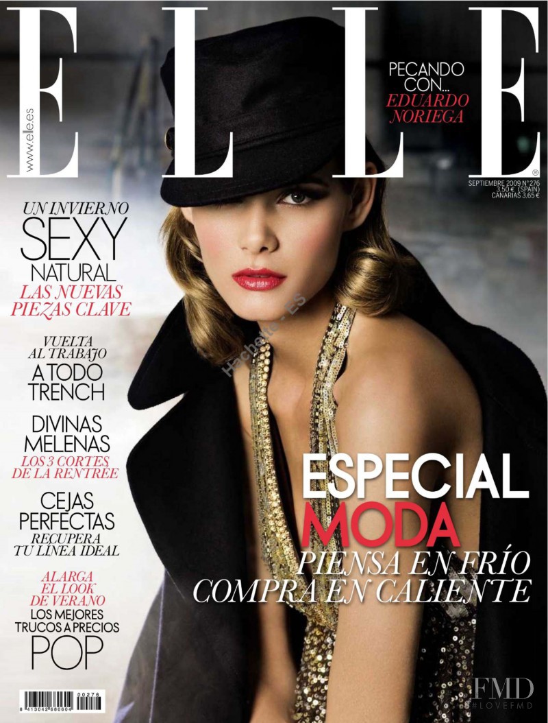 Flavia de Oliveira featured on the Elle Spain cover from September 2009