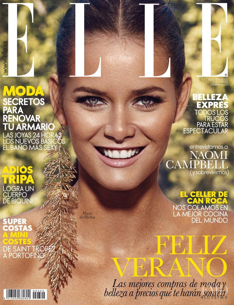 Flavia de Oliveira featured on the Elle Spain cover from July 2013
