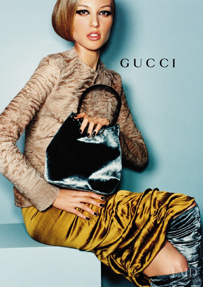 Liisa Winkler featured in  the Gucci advertisement for Autumn/Winter 1999