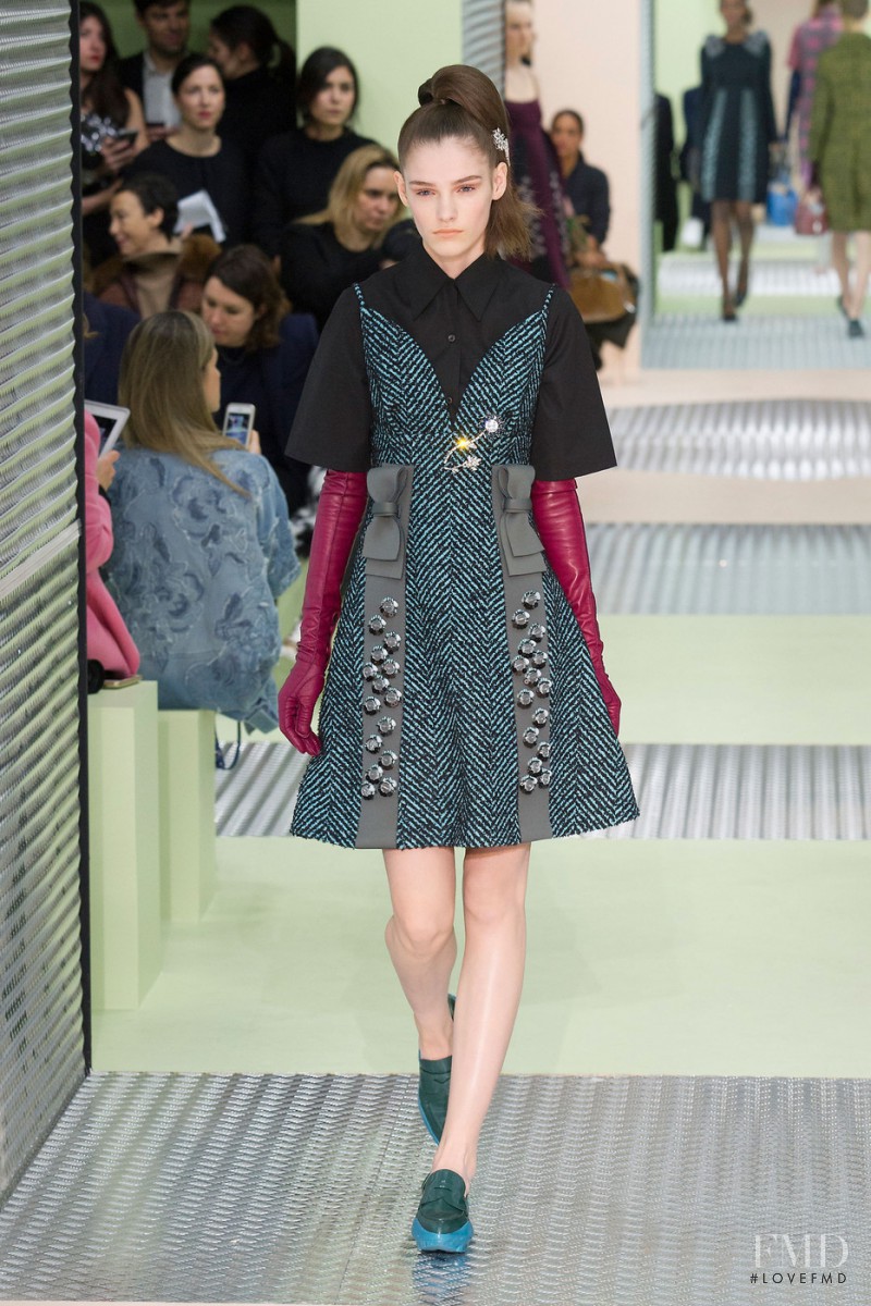 Inga Dezhina featured in  the Prada fashion show for Autumn/Winter 2015