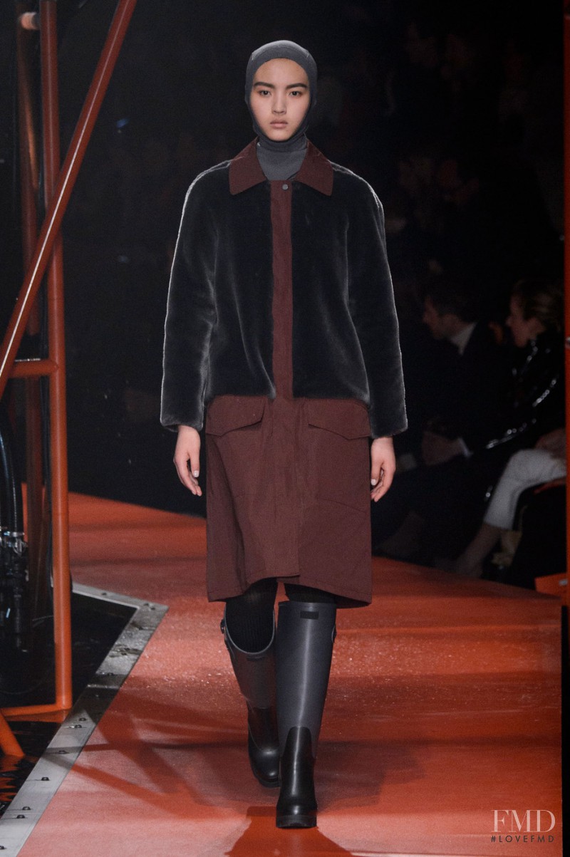 Luping Wang featured in  the Hunter fashion show for Autumn/Winter 2015