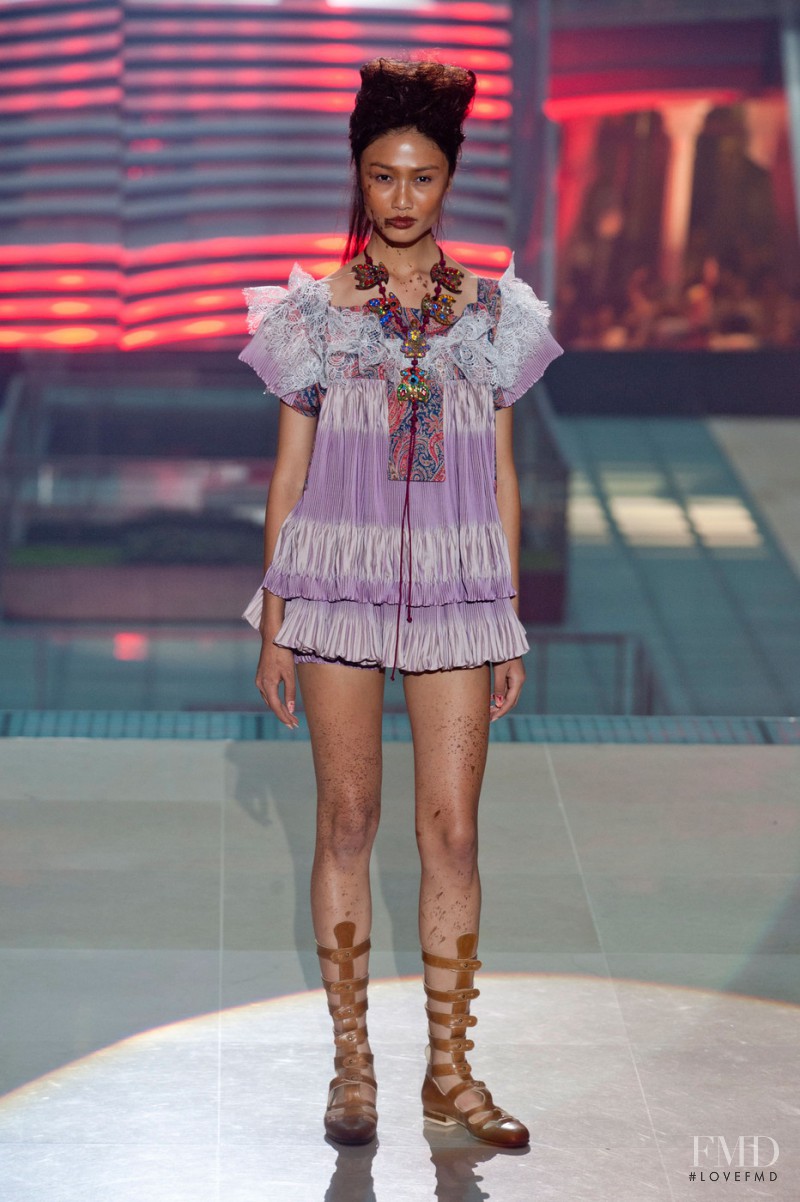 Yulia Saparniiazova featured in  the Vivienne Westwood Gold Label fashion show for Spring/Summer 2014