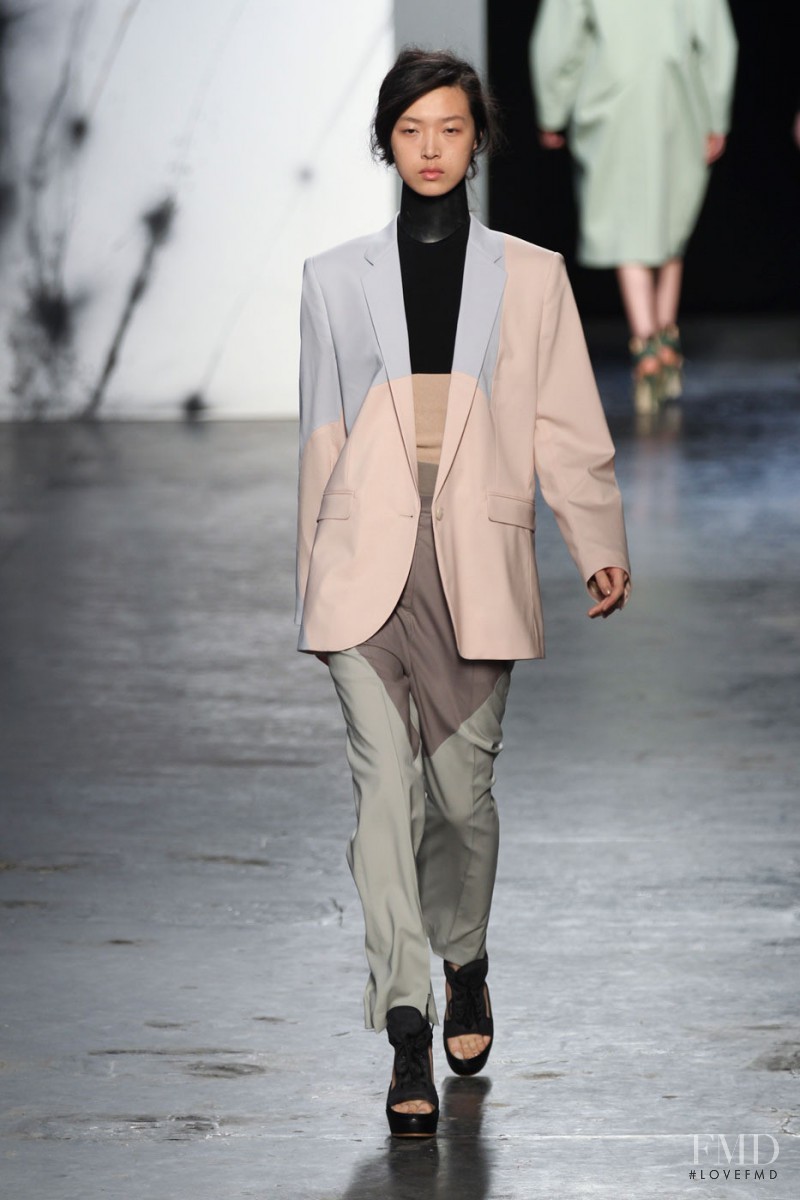 Tian Yi featured in  the Acne Studios fashion show for Autumn/Winter 2012