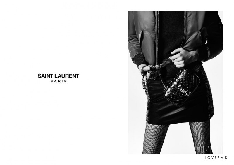 Flo Dron featured in  the Saint Laurent advertisement for Autumn/Winter 2015