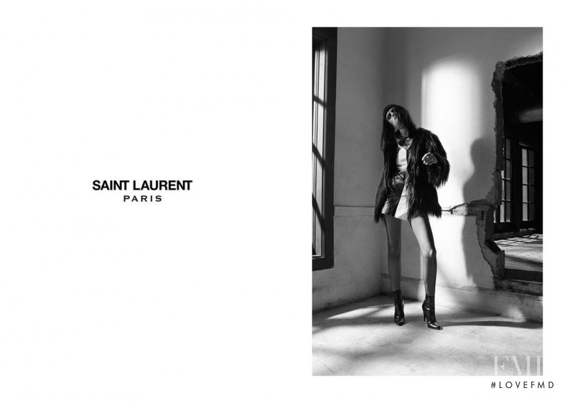 Flo Dron featured in  the Saint Laurent advertisement for Autumn/Winter 2015