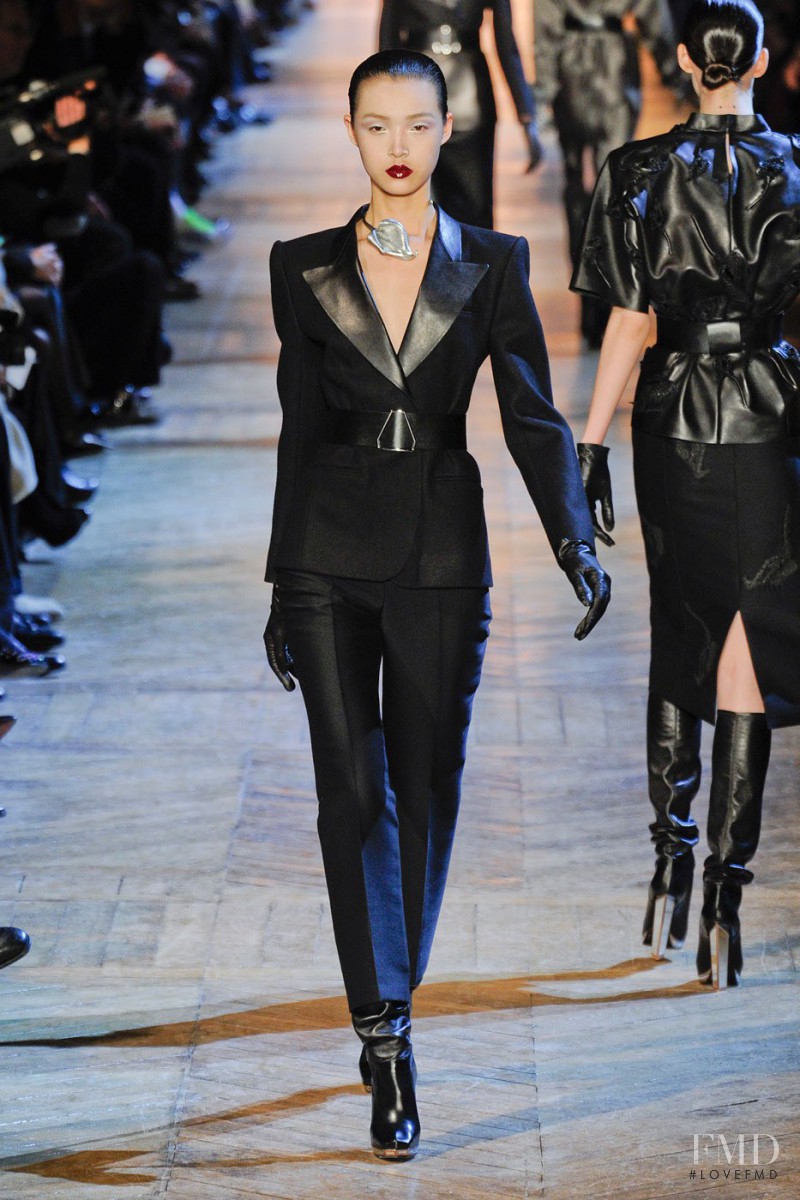 Tian Yi featured in  the Saint Laurent fashion show for Autumn/Winter 2012