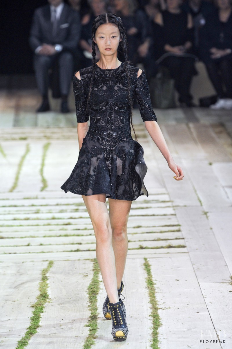 Lili Ji featured in  the Alexander McQueen fashion show for Spring/Summer 2011