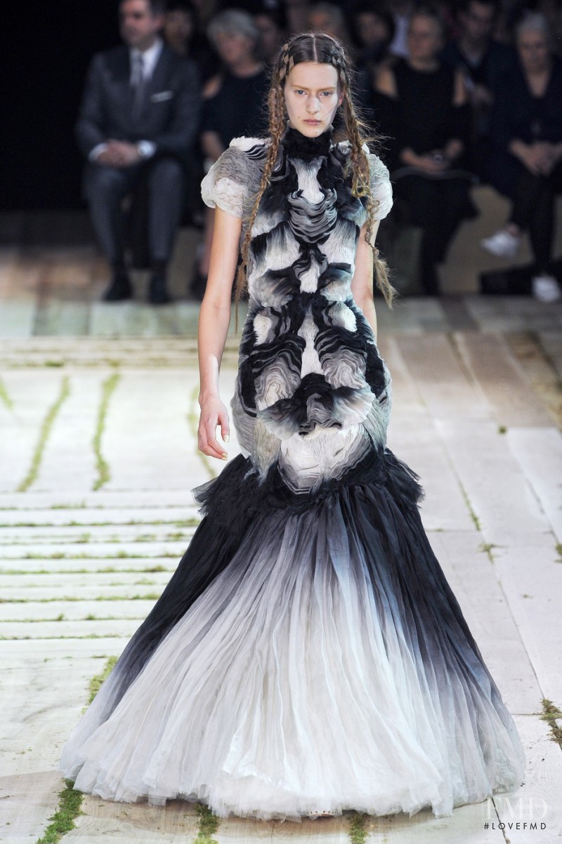 Carla Gebhart featured in  the Alexander McQueen fashion show for Spring/Summer 2011