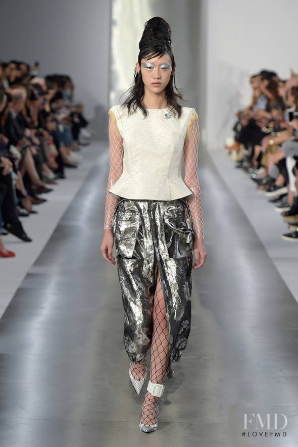 So Ra Choi featured in  the Maison Martin Margiela Défilé fashion show for Spring/Summer 2016