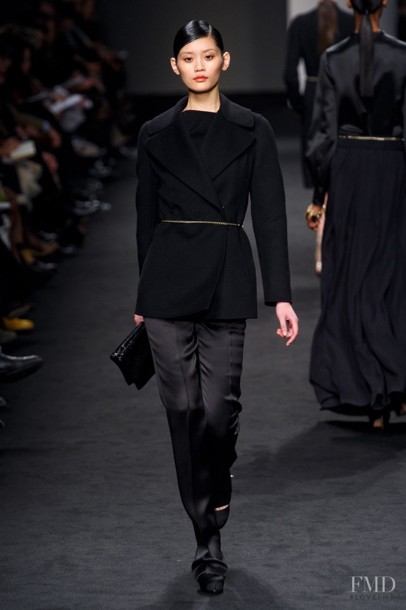 Ming Xi featured in  the Brioni fashion show for Autumn/Winter 2011