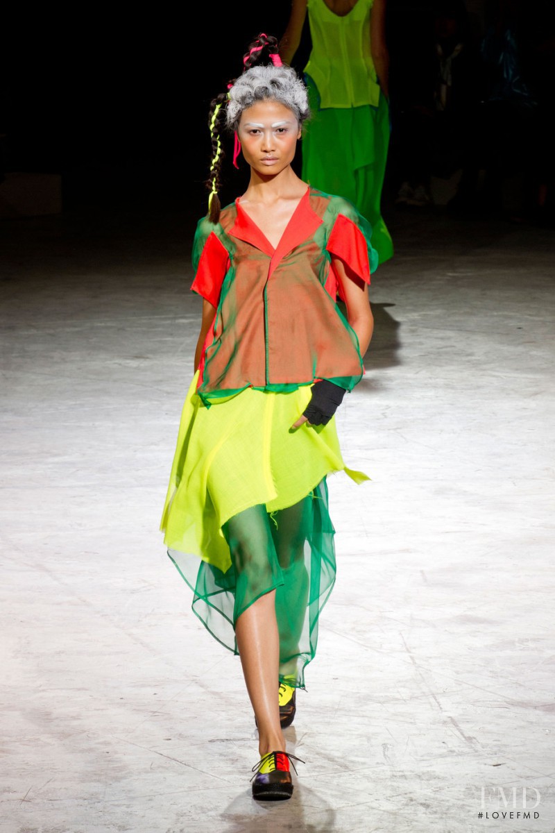 Yulia Saparniiazova featured in  the Yohji Yamamoto fashion show for Spring/Summer 2014