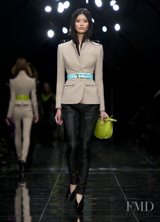 Ming Xi featured in  the Burberry Prorsum fashion show for Spring/Summer 2011