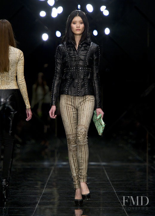 Ming Xi featured in  the Burberry Prorsum fashion show for Spring/Summer 2011