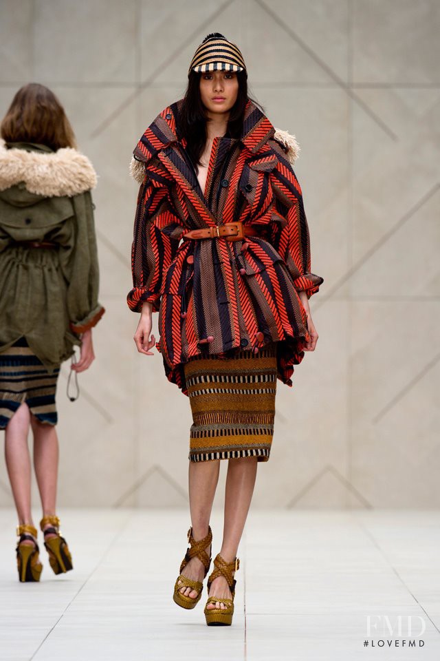 Shu Pei featured in  the Burberry Prorsum fashion show for Spring/Summer 2012