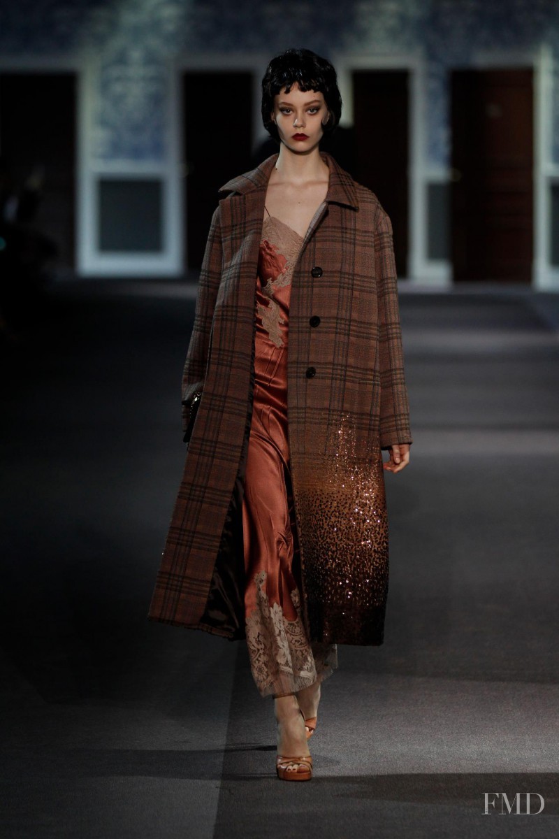 Ondria Hardin featured in  the Louis Vuitton fashion show for Autumn/Winter 2013