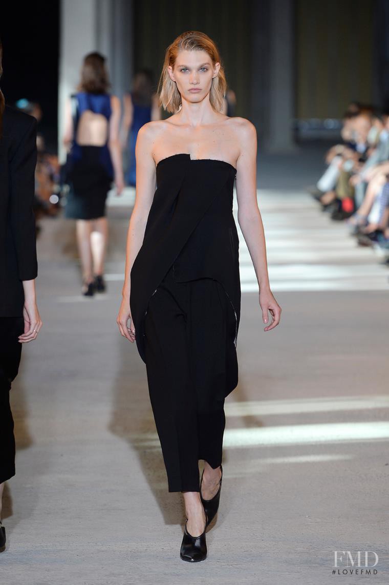 Irina Nikolaeva featured in  the Costume National fashion show for Spring/Summer 2014