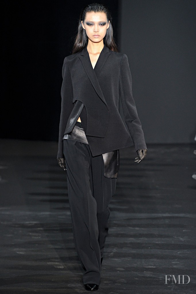 Tian Yi featured in  the Costume National fashion show for Autumn/Winter 2012