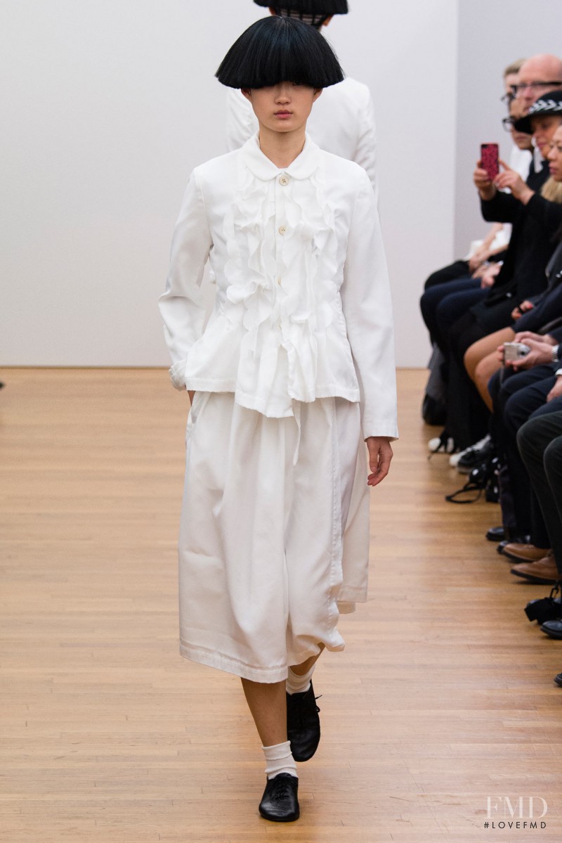 Hyun Ji Shin featured in  the Comme Des Garcons Comme Comme fashion show for Spring/Summer 2015