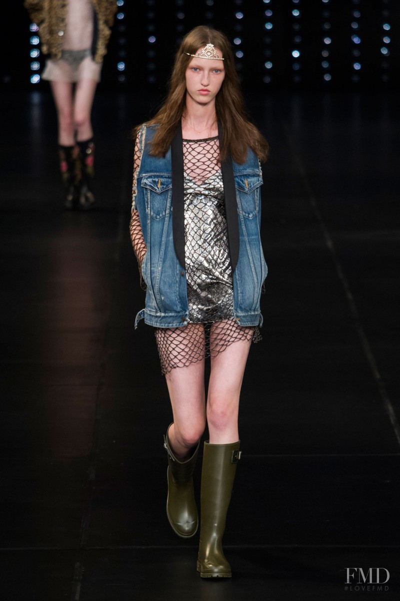 Liza Ostanina featured in  the Saint Laurent fashion show for Spring/Summer 2016