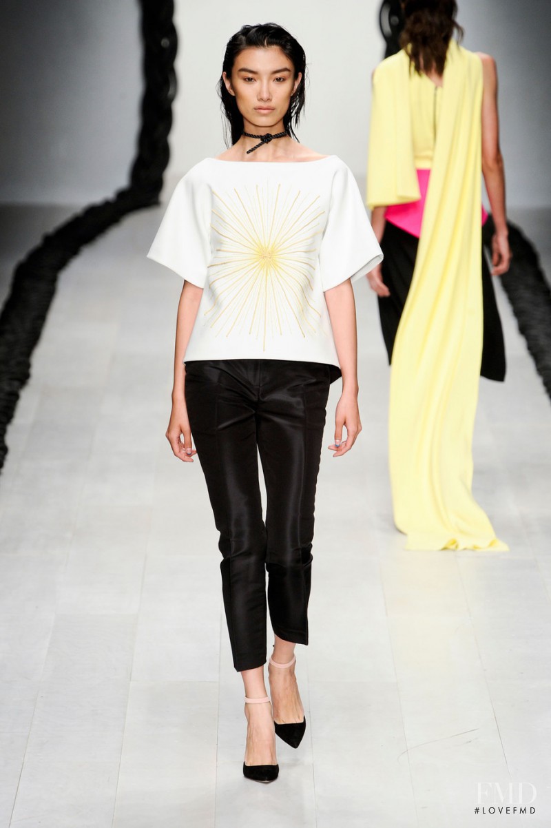Meng Die Hou featured in  the Osman by Osman Yousefzada fashion show for Spring/Summer 2013