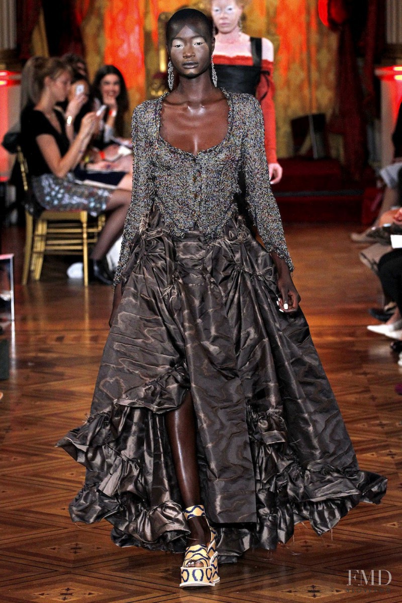 Ataui Deng featured in  the Vivienne Westwood Gold Label fashion show for Spring/Summer 2013