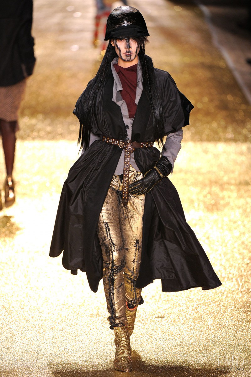 Si Tanwiboon featured in  the Vivienne Westwood Gold Label fashion show for Autumn/Winter 2011