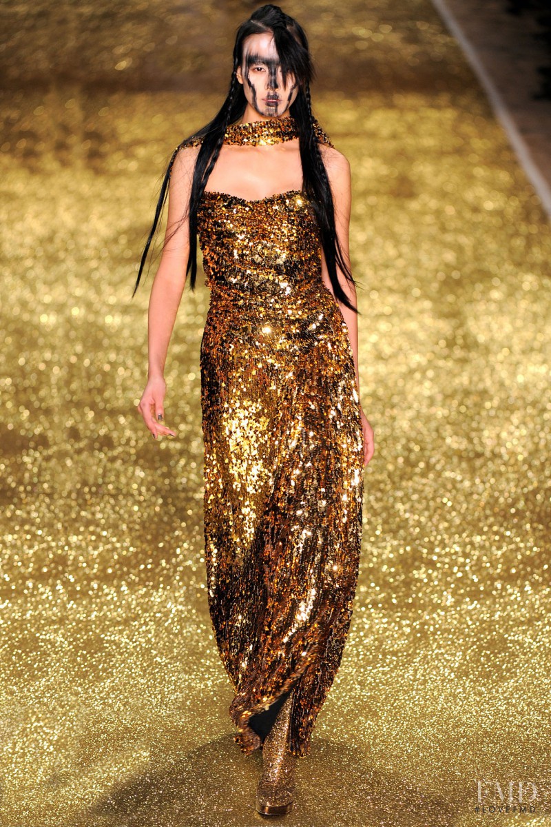 Si Tanwiboon featured in  the Vivienne Westwood Gold Label fashion show for Autumn/Winter 2011