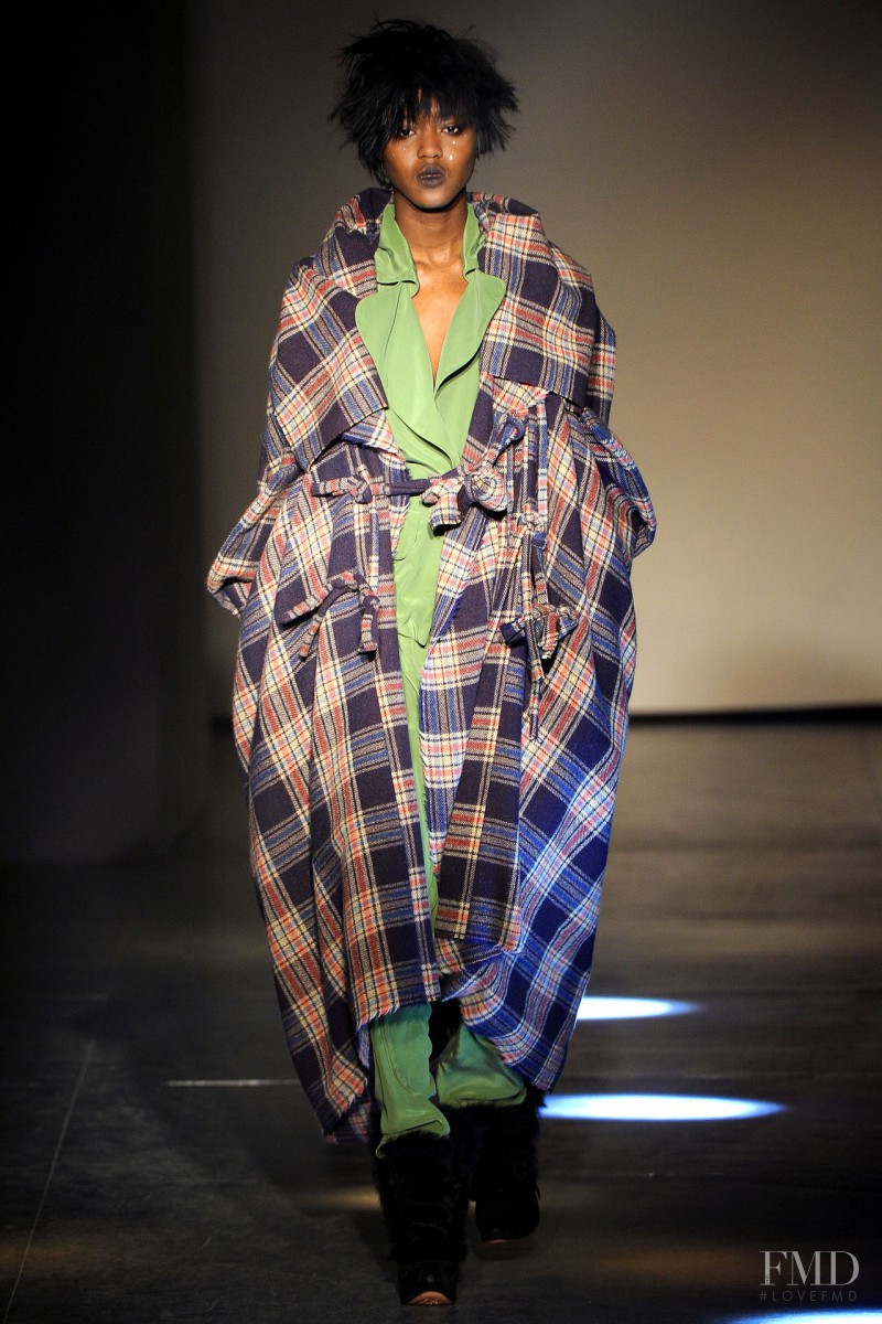 Alima Fofana featured in  the Vivienne Westwood Gold Label fashion show for Autumn/Winter 2012