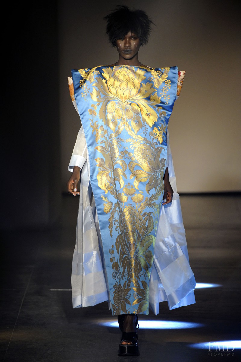 Ajuma Nasenyana featured in  the Vivienne Westwood Gold Label fashion show for Autumn/Winter 2012