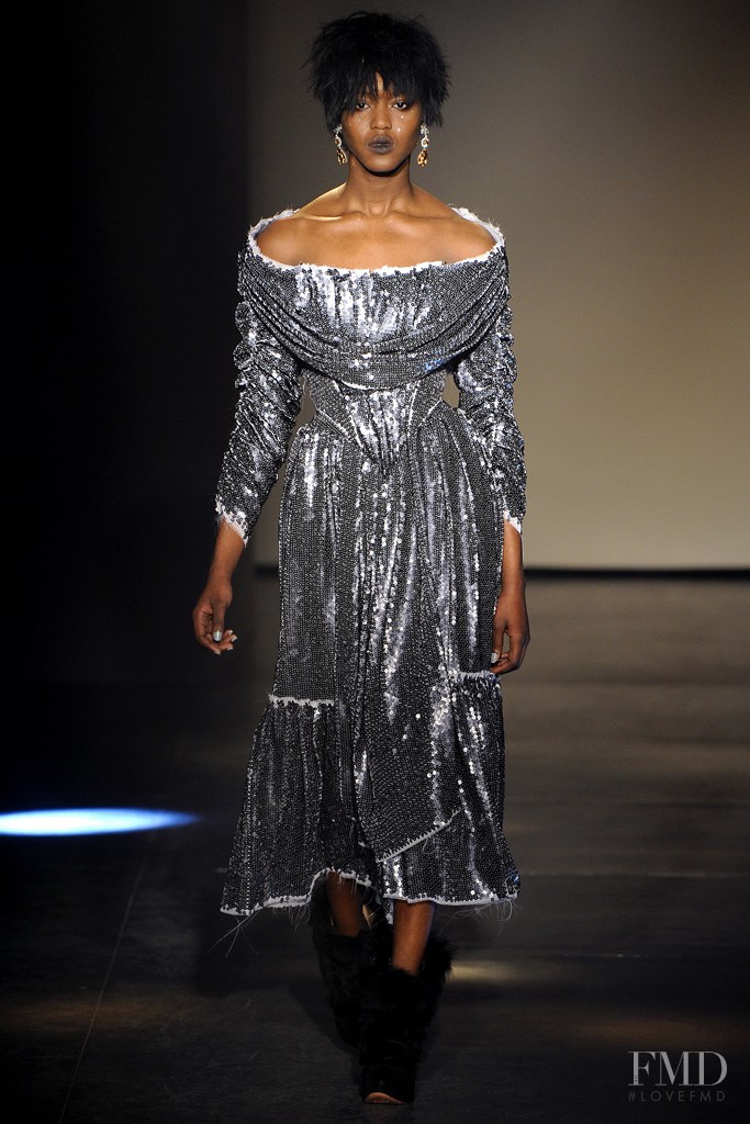 Alima Fofana featured in  the Vivienne Westwood Gold Label fashion show for Autumn/Winter 2012