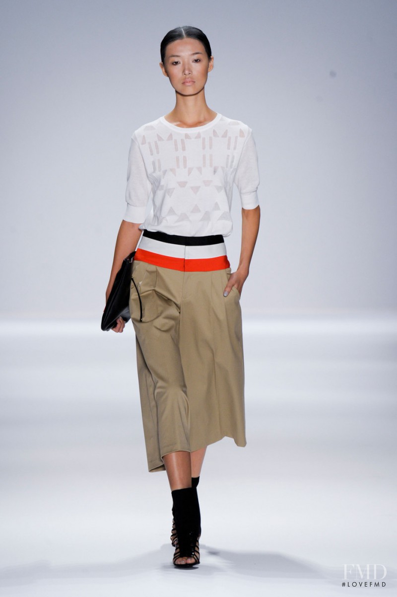 Tian Yi featured in  the Vivienne Tam fashion show for Spring/Summer 2013