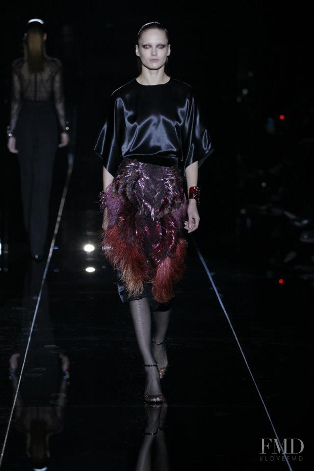 Karmen Pedaru featured in  the Gucci fashion show for Autumn/Winter 2013