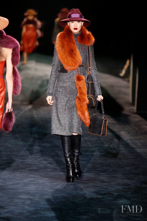 Shu Pei featured in  the Gucci fashion show for Autumn/Winter 2011