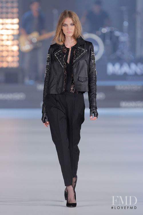 Irina Nikolaeva featured in  the Mango fashion show for Spring/Summer 2014